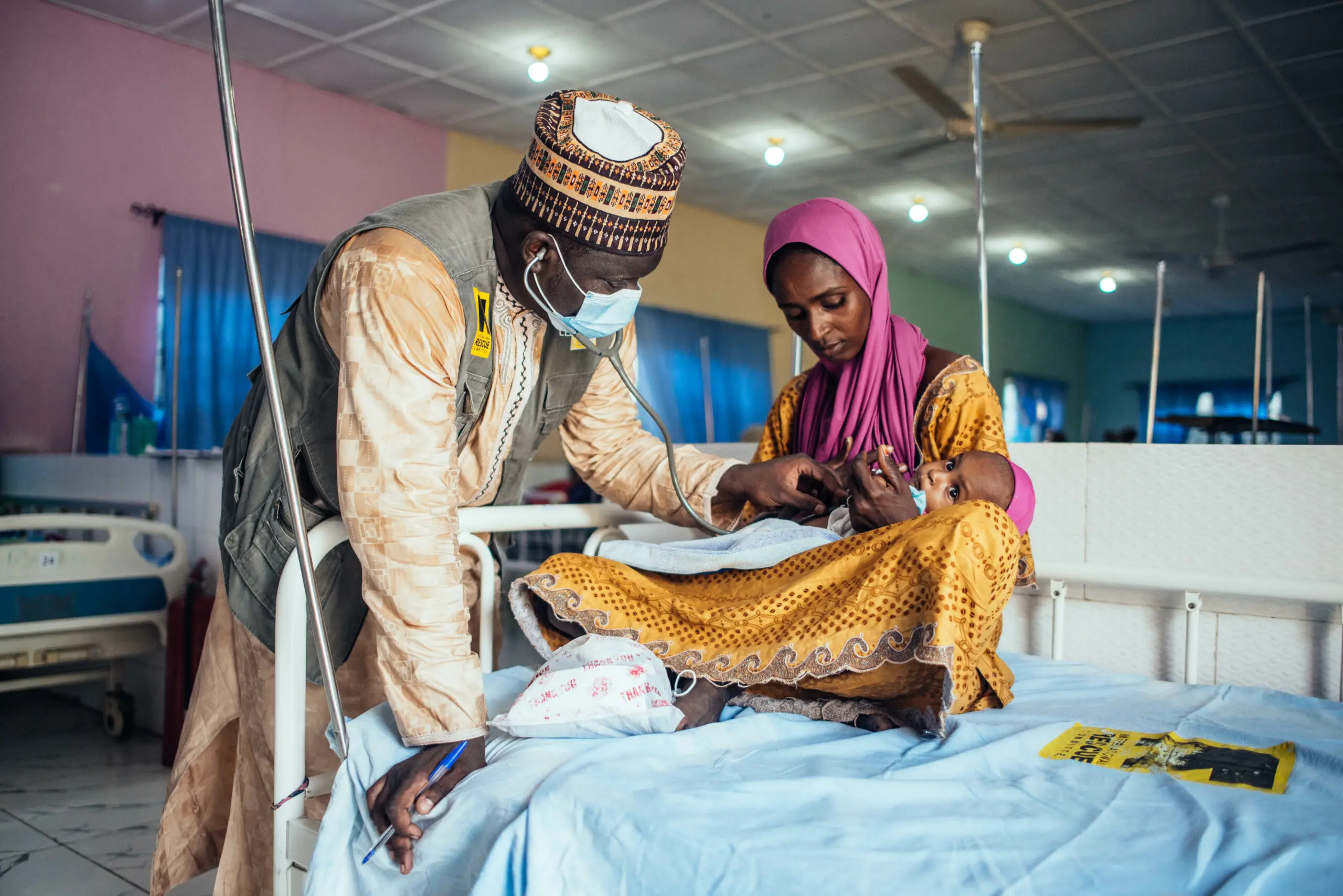 Doctor helping child