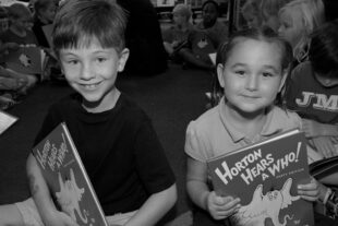 Kids holding books